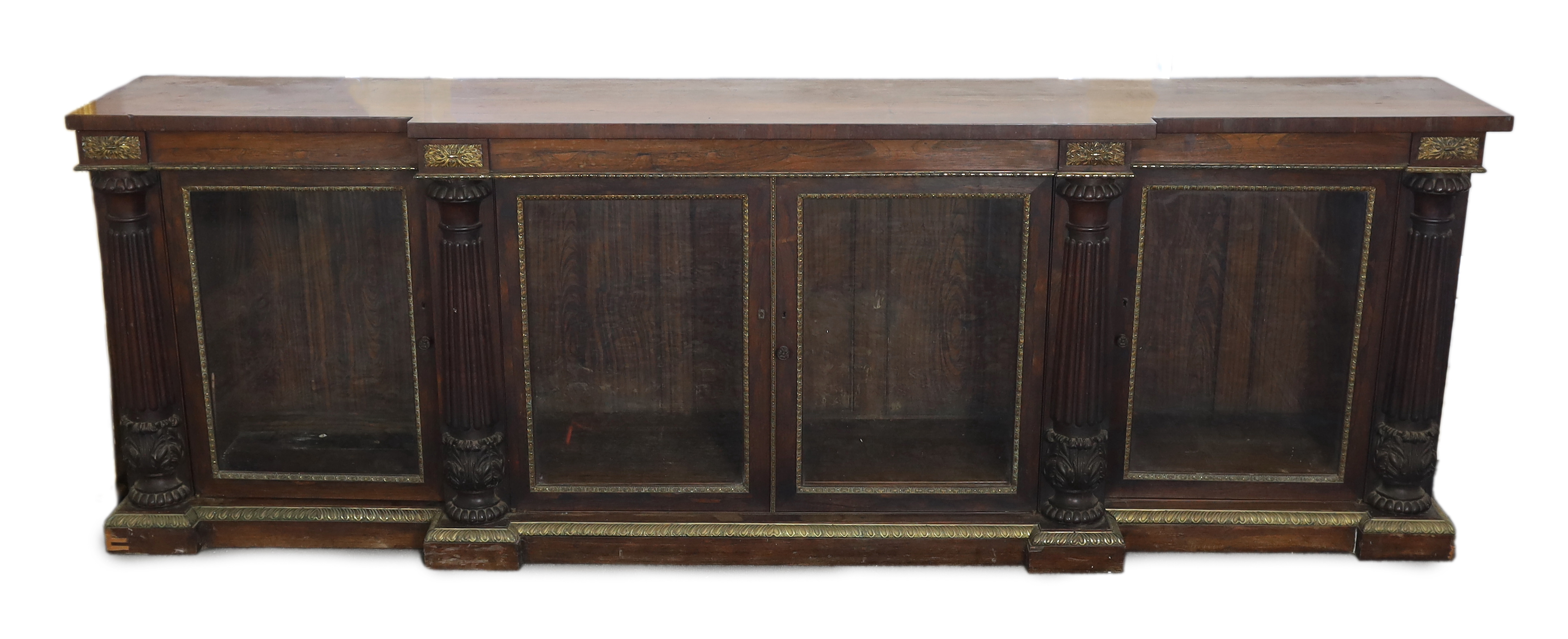 A George IV ormolu mounted rosewood breakfront dwarf bookcase, width 306cm, depth 60cm, height 102cm